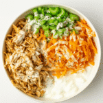 Buffalo Chicken Cottage Cheese Bowl: High-Protein, Easy & Viral Recipe 5 High-protein buffalo chicken cottage cheese bowl with shredded carrots and celery